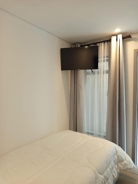 Postel nebo postele na pokoji v ubytování HOTEl SARÒN