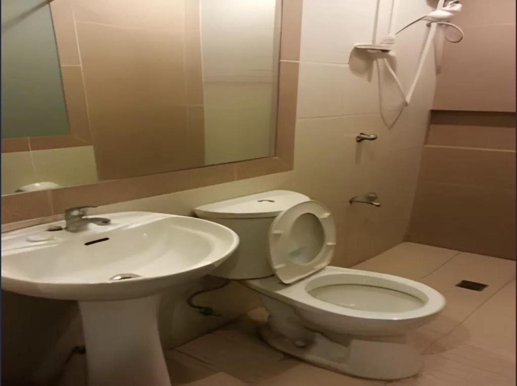 Koupelna v ubytování Hotel Mikka