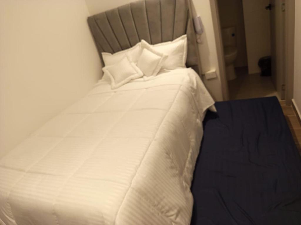 Postel nebo postele na pokoji v ubytování HOTEl SARÒN