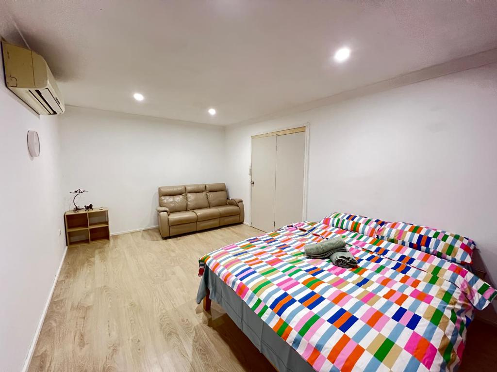 Postel nebo postele na pokoji v ubytování H Room