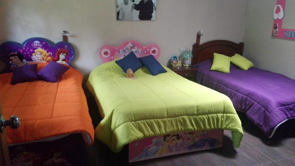 Postel nebo postele na pokoji v ubytování D' luxe