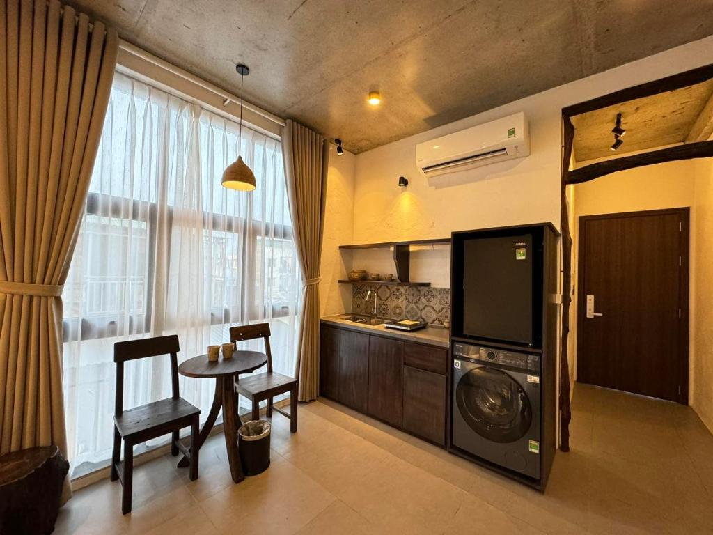 Kuchyň nebo kuchyňský kout v ubytování Eco & Rustic Home Hoian