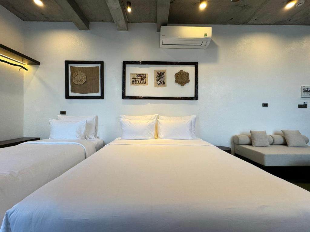 Postel nebo postele na pokoji v ubytování Eco & Rustic Home Hoian