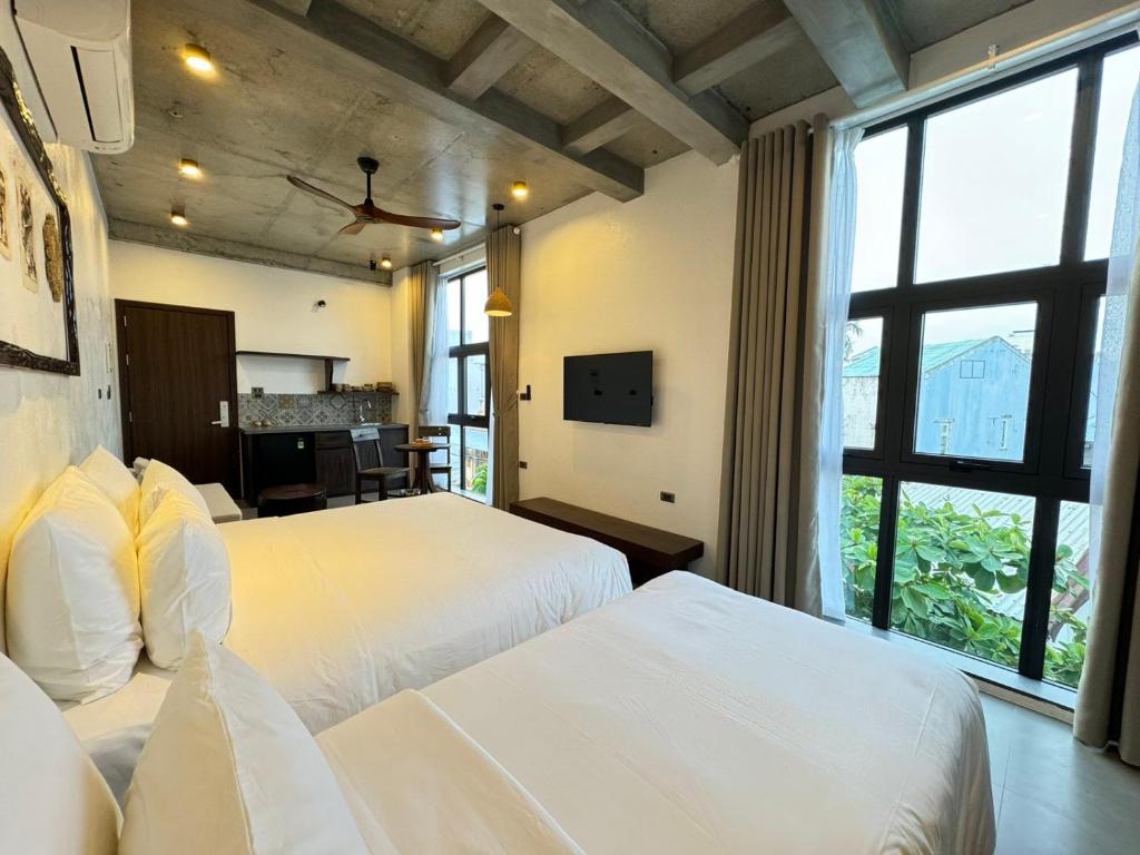 Postel nebo postele na pokoji v ubytování Eco & Rustic Home Hoian