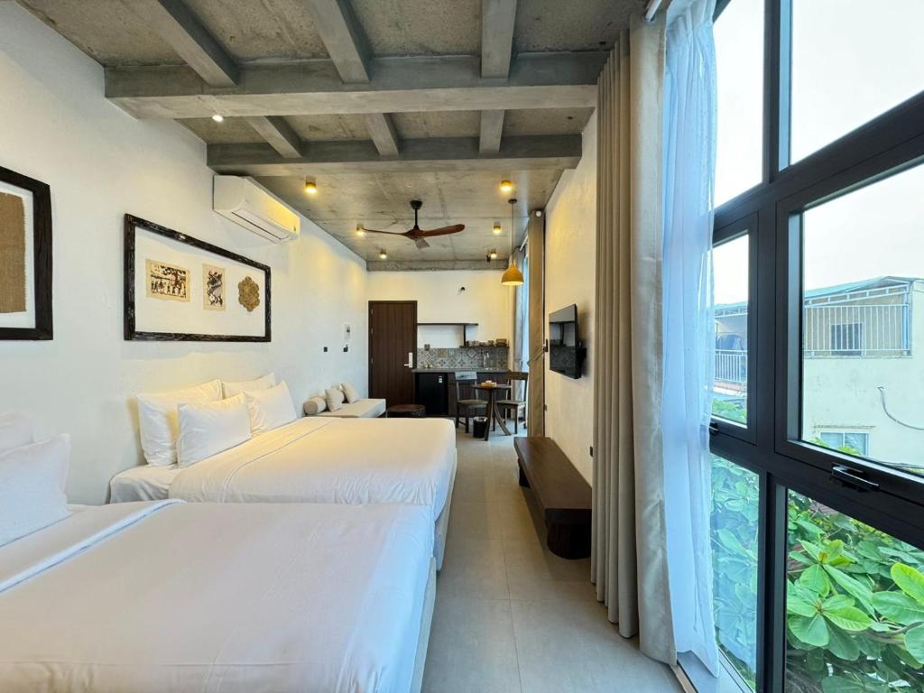 Postel nebo postele na pokoji v ubytování Eco & Rustic Home Hoian