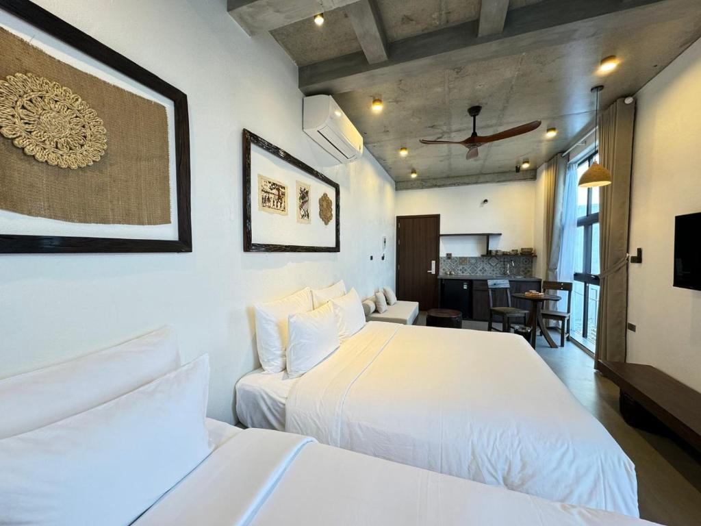 Postel nebo postele na pokoji v ubytování Eco & Rustic Home Hoian