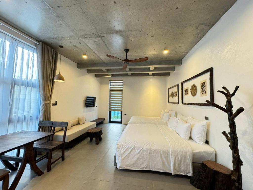 Postel nebo postele na pokoji v ubytování Eco & Rustic Home Hoian