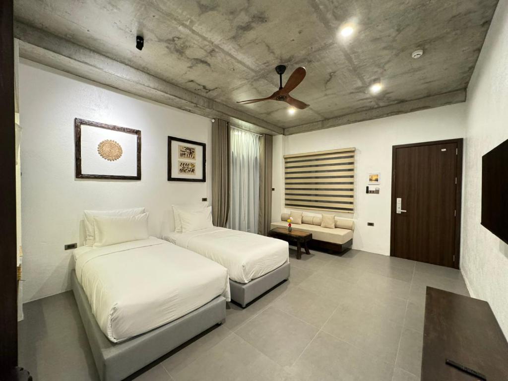Postel nebo postele na pokoji v ubytování Eco & Rustic Home Hoian