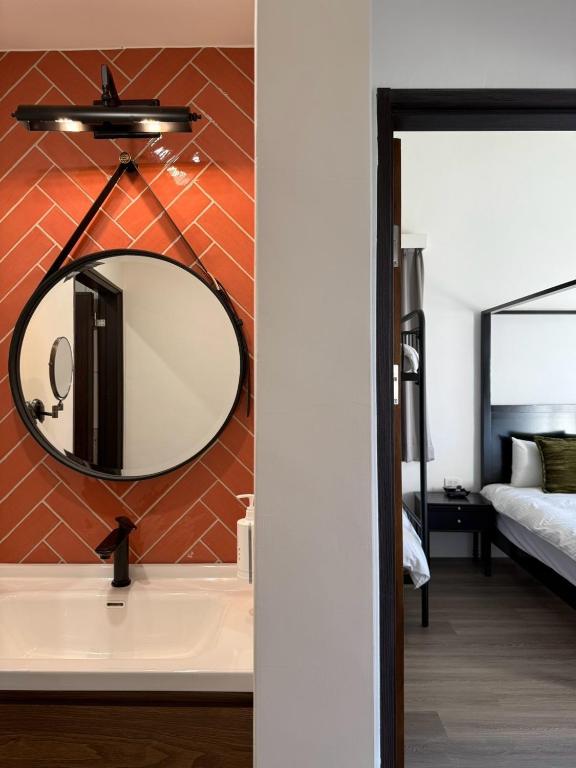 Postel nebo postele na pokoji v ubytování Red Brick Villas