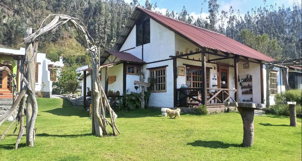 Κήπος έξω από το Hosteria Taita Pacho