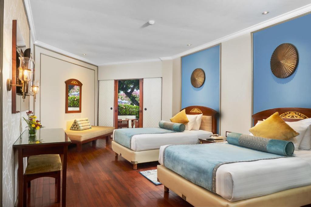 Postel nebo postele na pokoji v ubytování Grand Mirage Resort & Thalasso Bali