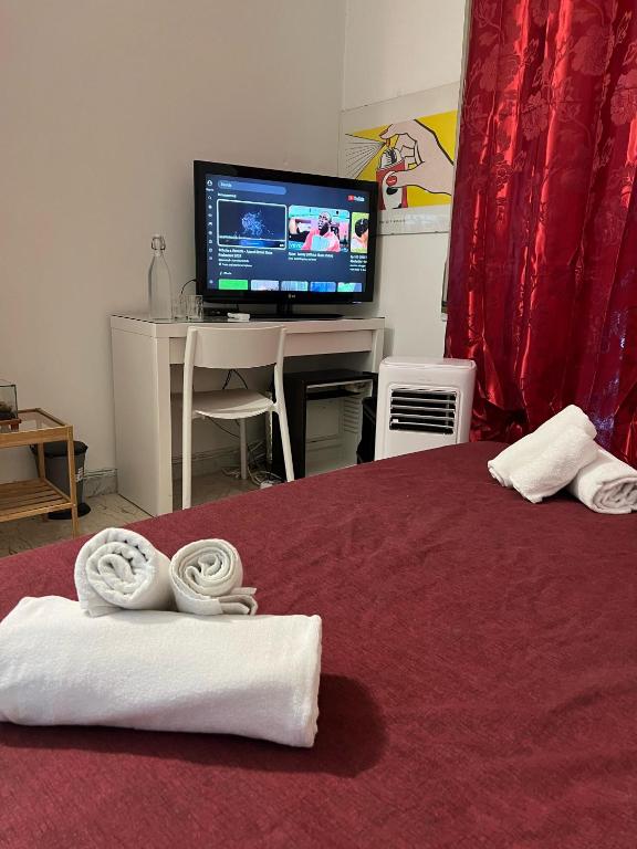 Posteľ alebo postele v izbe v ubytovaní 4 Season B&B Roma