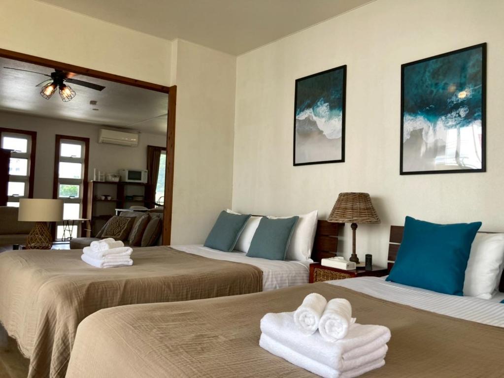 Ένα ή περισσότερα κρεβάτια σε δωμάτιο στο Painagama House