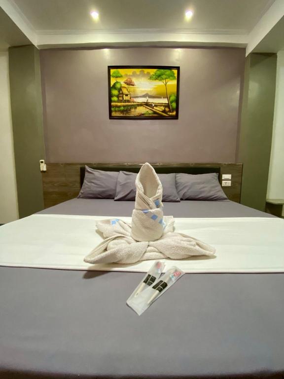 Postel nebo postele na pokoji v ubytování Elena's Suite El Nido
