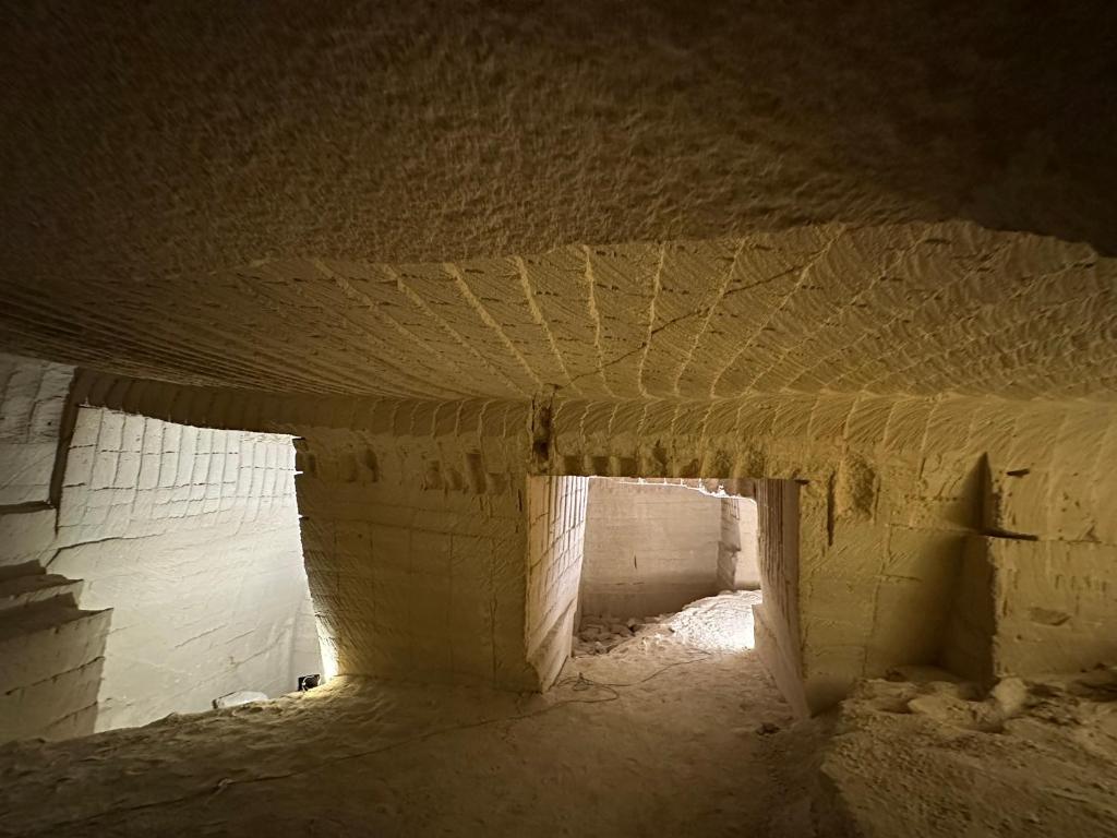 a tunnel in a building with snow on the ground at Villa MAE Favignana in Favignana