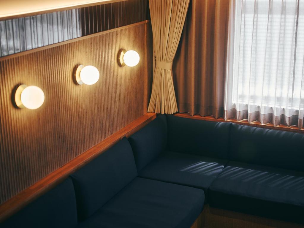 Posezení v ubytování illi Mani Shibuya