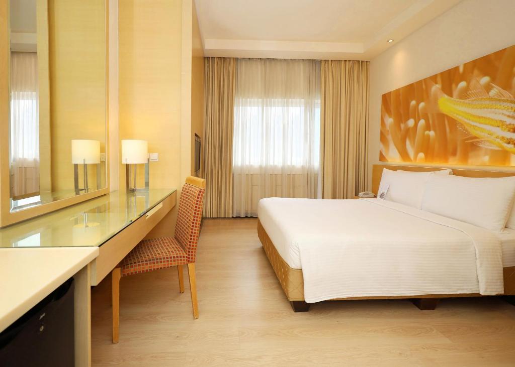 Postel nebo postele na pokoji v ubytování ANSA Hotel Kuala Lumpur