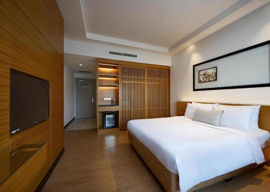 Postel nebo postele na pokoji v ubytování ANSA Hotel Kuala Lumpur