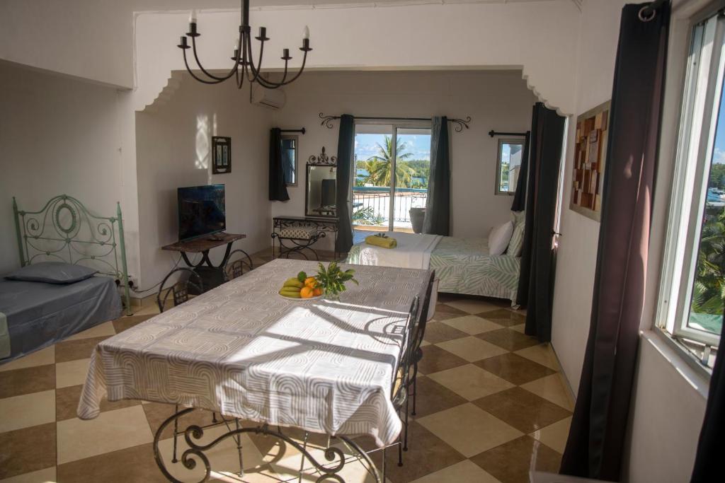 Postel nebo postele na pokoji v ubytování Le Dodo Appartements