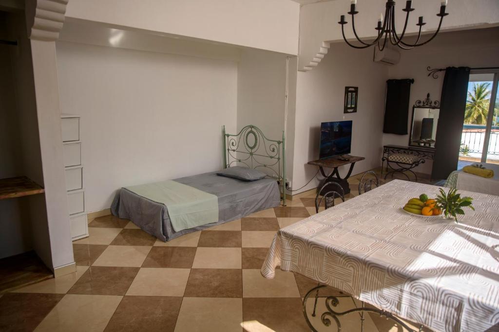 Postel nebo postele na pokoji v ubytování Le Dodo Appartements