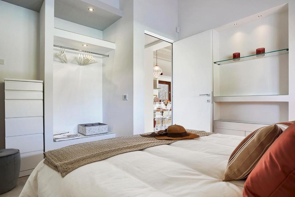 Łóżko lub łóżka w pokoju w obiekcie Villa Scarlet con piscina privata