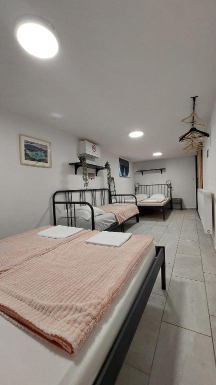 Postel nebo postele na pokoji v ubytování Apartma Licko