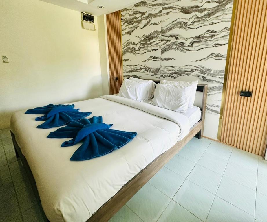 Postel nebo postele na pokoji v ubytování Kohchang Cabana Big Hotel with swiming pool
