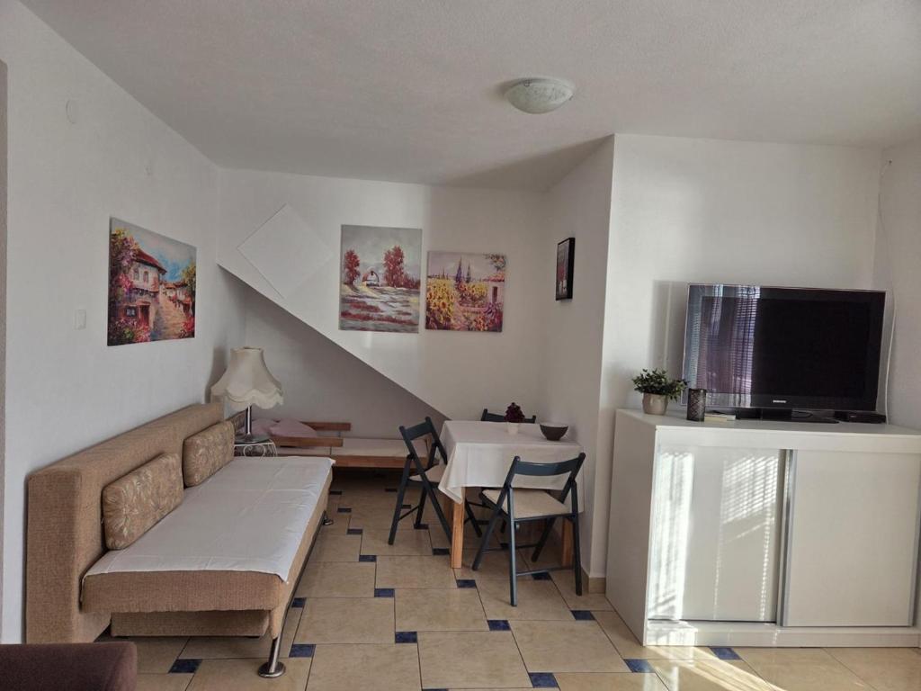 Kuchyň nebo kuchyňský kout v ubytování Apartments Vrabac