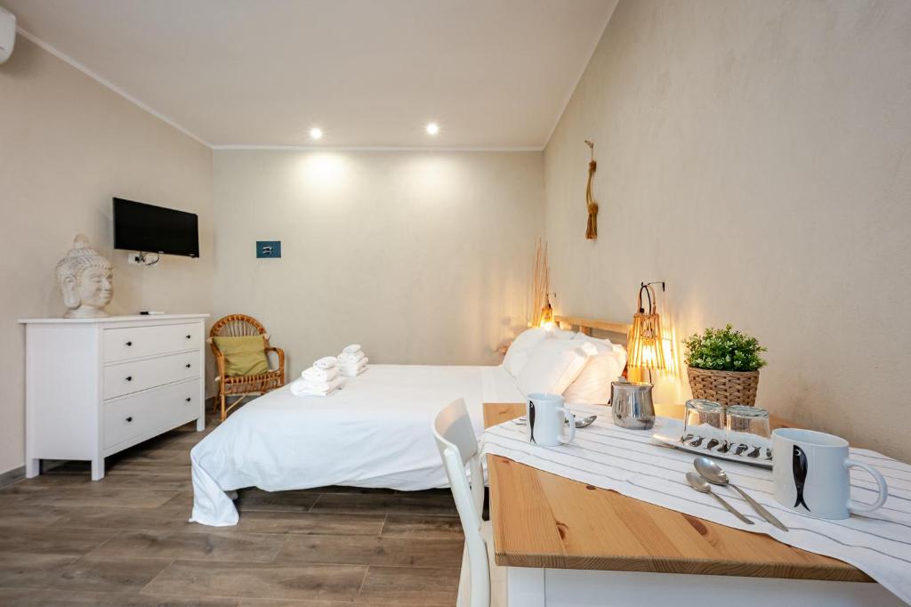 Postel nebo postele na pokoji v ubytování Incanto Manarola