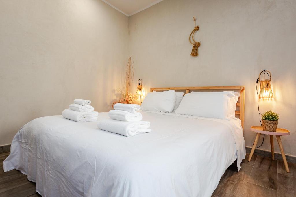 Postel nebo postele na pokoji v ubytování Incanto Manarola