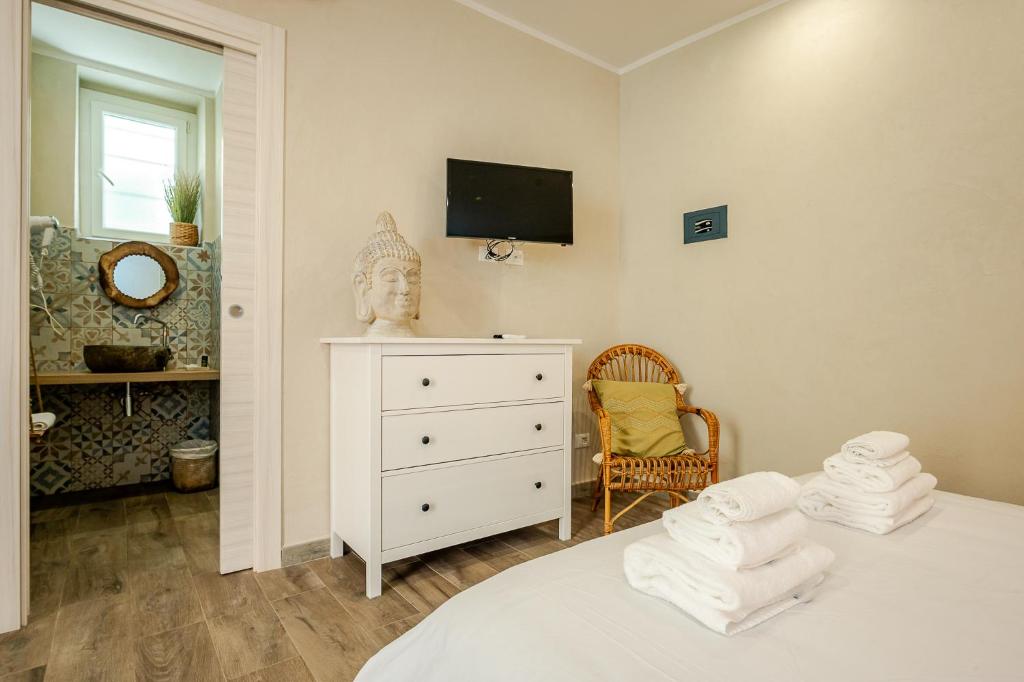 Postel nebo postele na pokoji v ubytování Incanto Manarola
