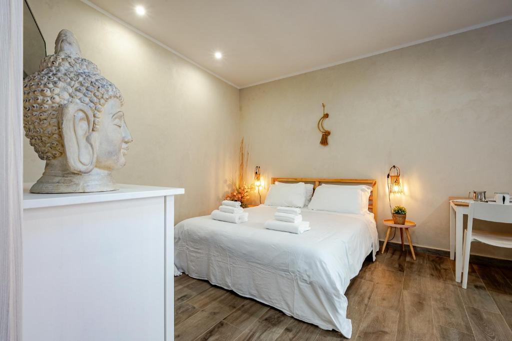 Postel nebo postele na pokoji v ubytování Incanto Manarola