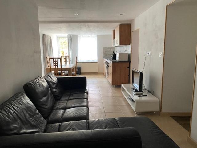 Kuchyň nebo kuchyňský kout v ubytování Appart familial, jeux et matériel enfants, fitness