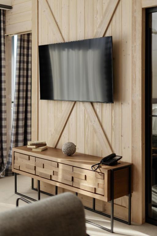TV a/nebo společenská místnost v ubytování Wulfenia Hotel & Spa