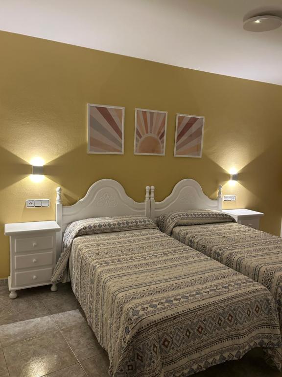 Cama o camas de una habitación en Hostal Casa Vispe