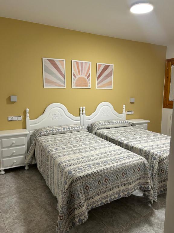Cama o camas de una habitación en Hostal Casa Vispe