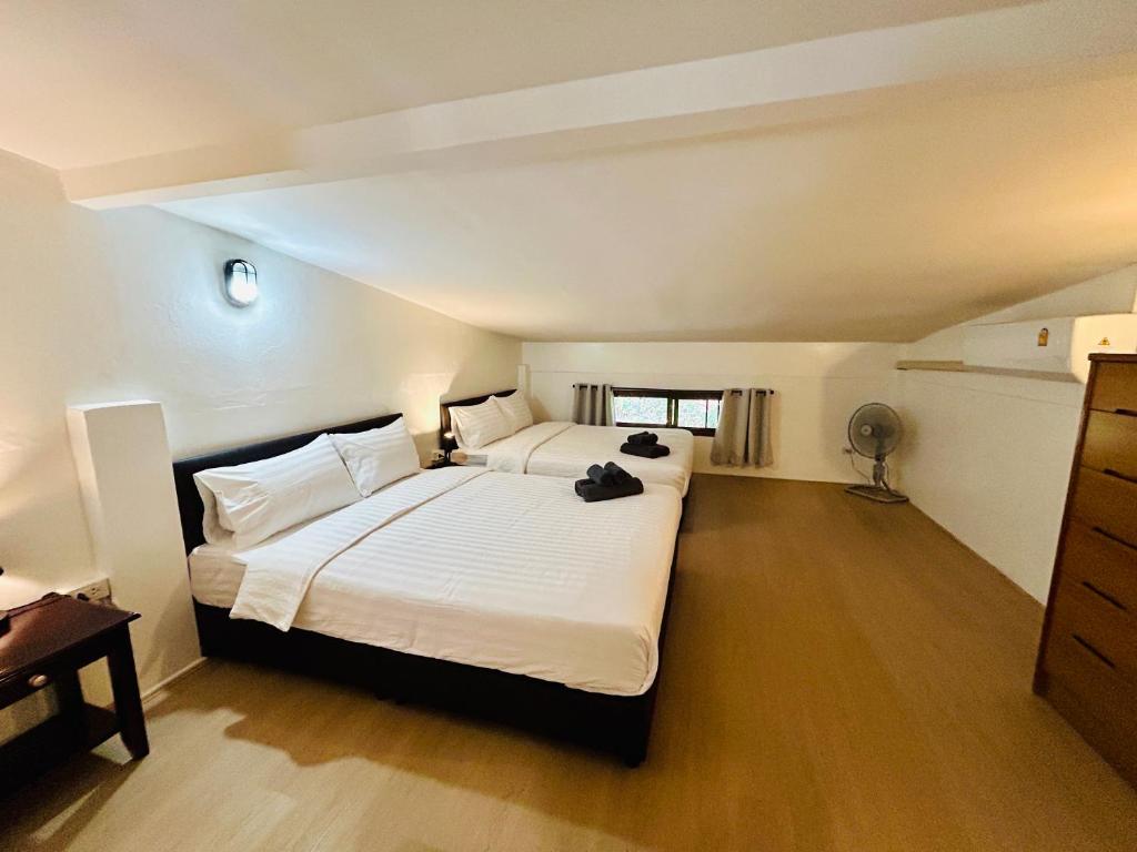 Ένα ή περισσότερα κρεβάτια σε δωμάτιο στο Island House Rentals 46