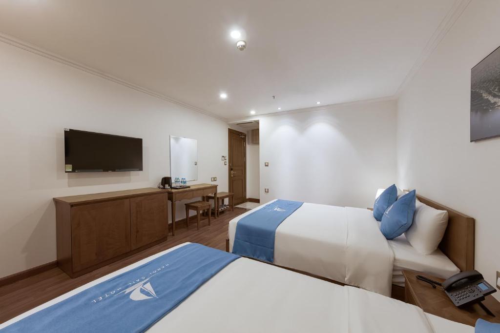 TV a/nebo společenská místnost v ubytování Hanoi Sail Hotel