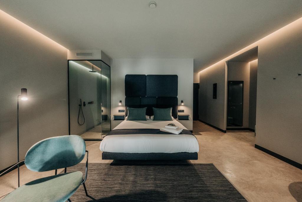 TV a/nebo společenská místnost v ubytování MUUN Landscape Hotel