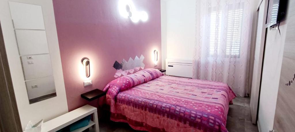 Postel nebo postele na pokoji v ubytování Gilda