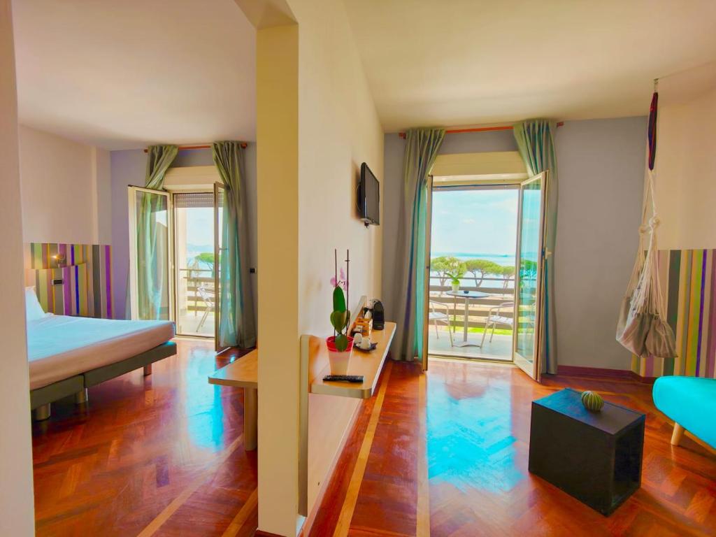 Postel nebo postele na pokoji v ubytování HA Hotel