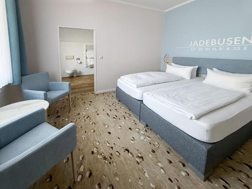 Postel nebo postele na pokoji v ubytování DORMERO Hotel Wilhelmshaven