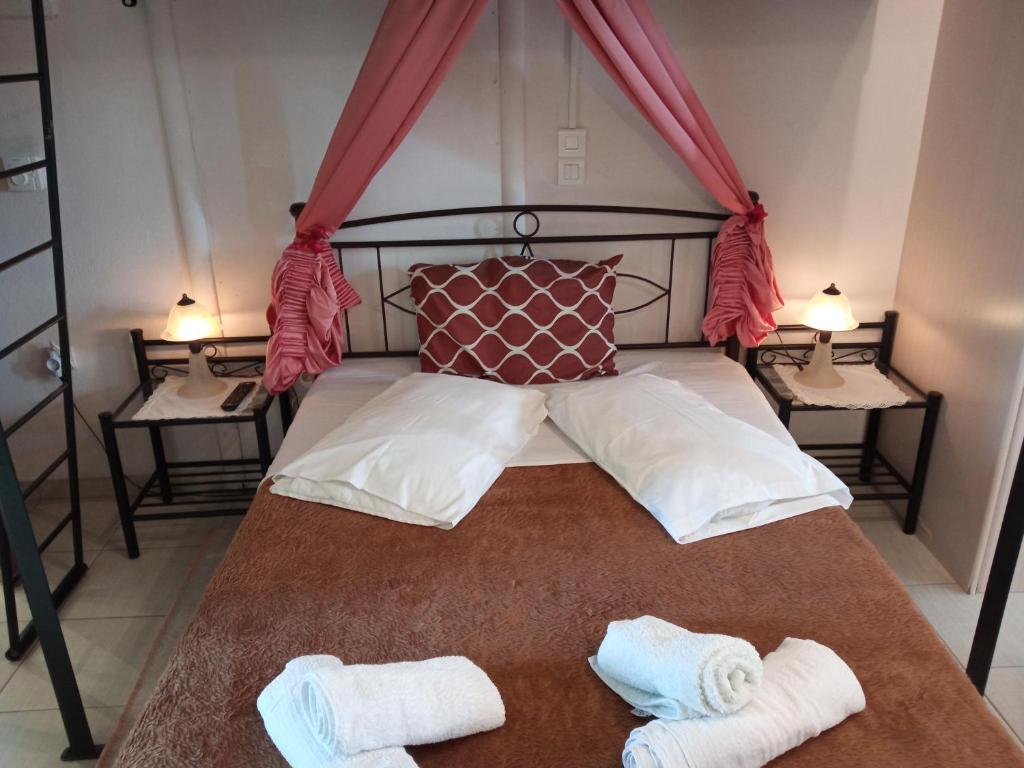 Ένα ή περισσότερα κρεβάτια σε δωμάτιο στο Guest house Giannad Distomo