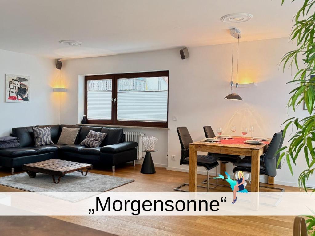 Ruang duduk di Ferienwohnung Morgensonne - modern und freundlich in zentraler Lage