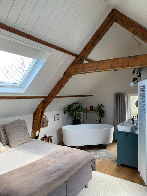 Posezení v ubytování B&B De Vrijbuiter
