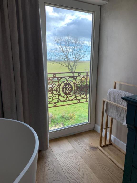 Fotografie z fotogalerie ubytování B&B De Vrijbuiter v destinaci De Cocksdorp