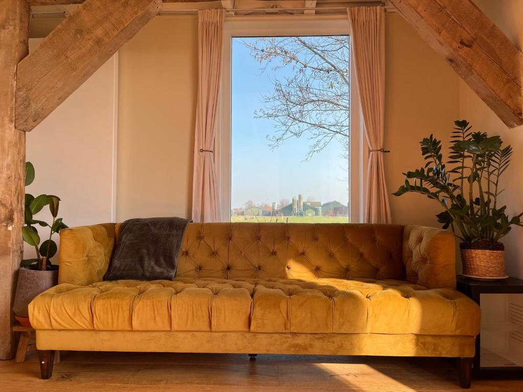 Posezení v ubytování B&B De Vrijbuiter