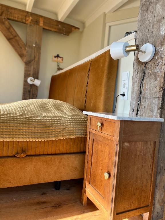Postel nebo postele na pokoji v ubytování B&B De Vrijbuiter
