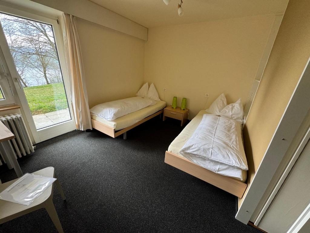 Postel nebo postele na pokoji v ubytování Vitabella Rügel