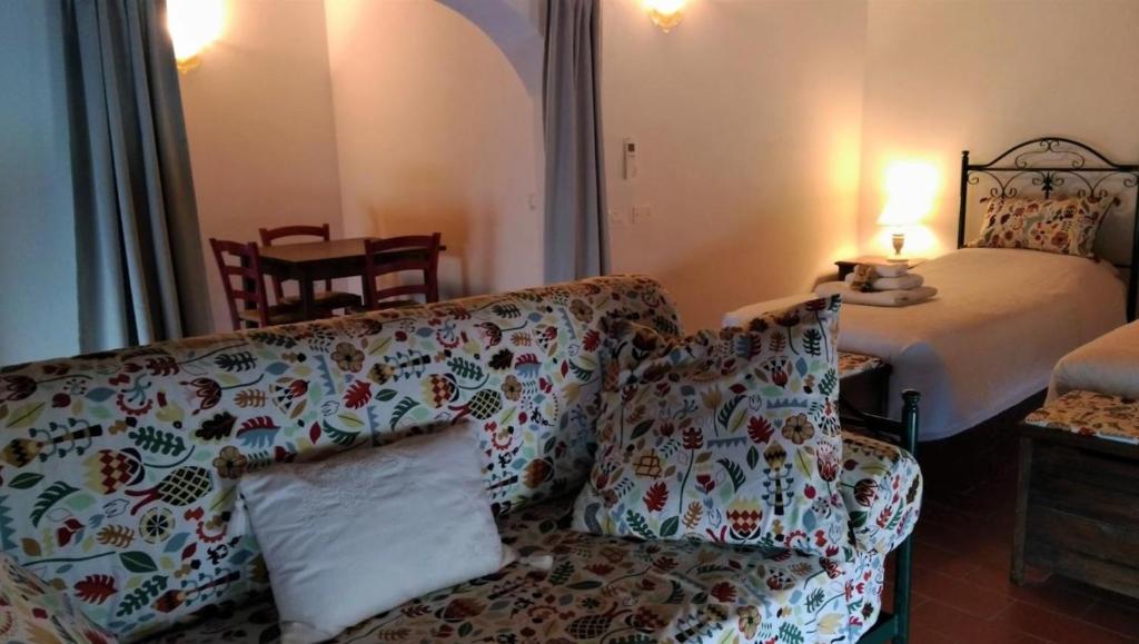 Postel nebo postele na pokoji v ubytování B&B Le Ripe